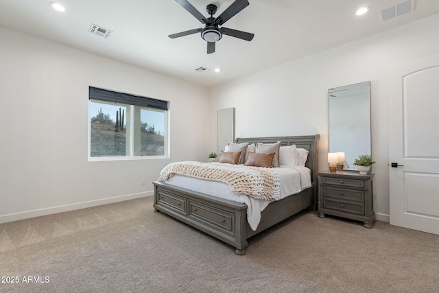 bedroom with light carpet and ceiling fan