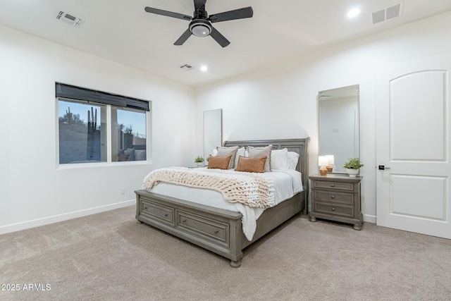 bedroom with light carpet and ceiling fan