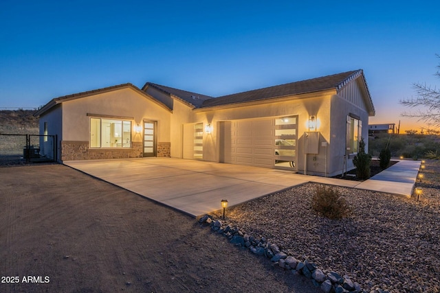 view of front of home with a garage