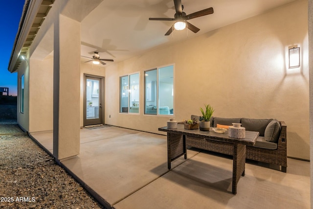 view of patio featuring an outdoor hangout area and ceiling fan