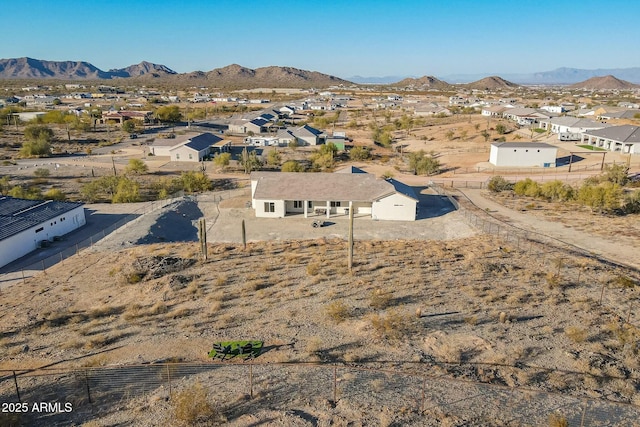 drone / aerial view featuring a mountain view