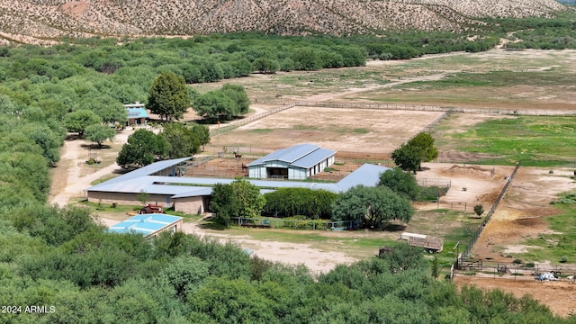 birds eye view of property featuring a rural view