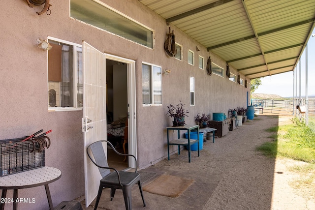 view of patio featuring fence