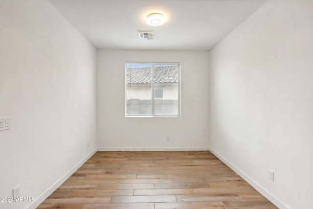 unfurnished room featuring light hardwood / wood-style flooring