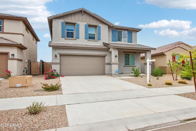 view of front of property with a garage