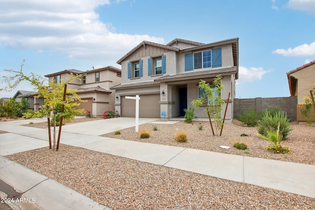 view of front of property featuring a garage