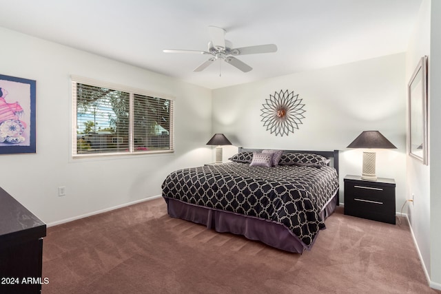 bedroom with ceiling fan and carpet floors