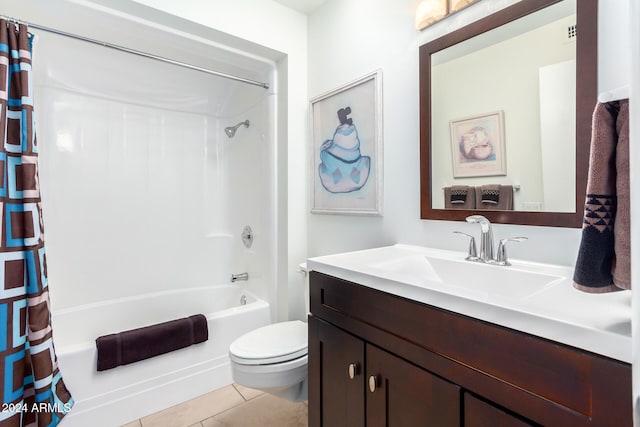 full bathroom with tile patterned floors, vanity, toilet, and shower / bathtub combination with curtain