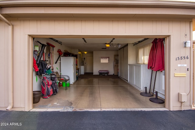 garage with white refrigerator