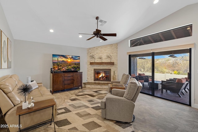 living room featuring lofted ceiling, a fireplace, visible vents, and recessed lighting