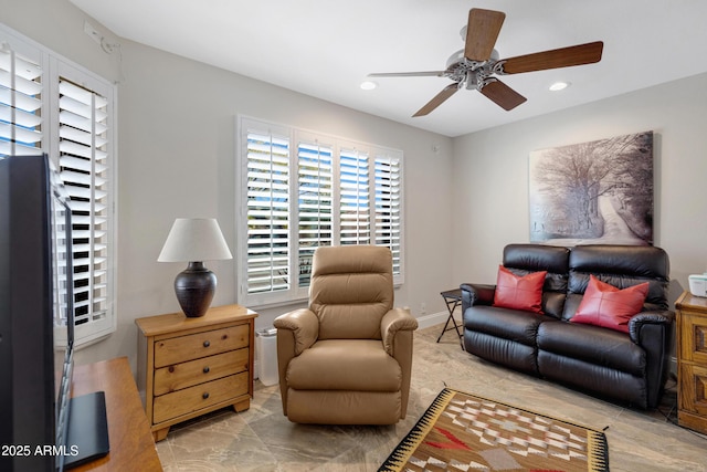 sitting room featuring a ceiling fan, recessed lighting, and baseboards