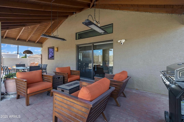 view of patio featuring outdoor dining area and an outdoor living space