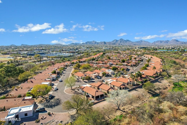 birds eye view of property with a residential view and a mountain view