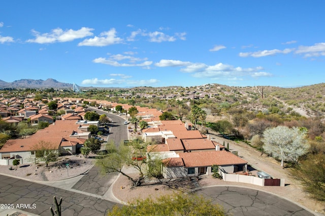 birds eye view of property with a residential view and a mountain view