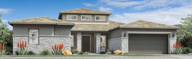 view of front of house featuring a garage, stucco siding, and stone siding