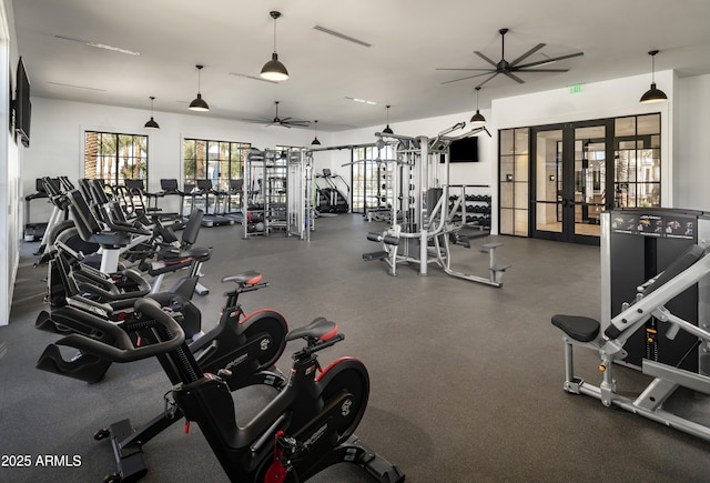 workout area with french doors, ceiling fan, and visible vents