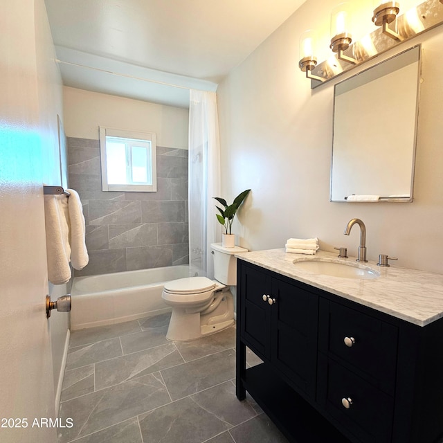 full bathroom with toilet, tiled shower / bath combo, and vanity