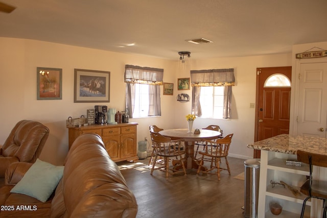 375 S Companero Rd, Saint David, AZ 85630 - dining area with dark wood finished floors and baseboards