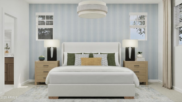 bedroom with baseboards, carpet, and wallpapered walls