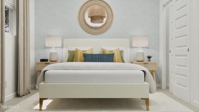 carpeted bedroom featuring baseboards