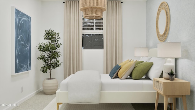 bedroom with baseboards and carpet flooring