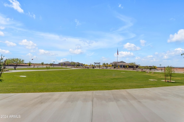 surrounding community featuring a yard