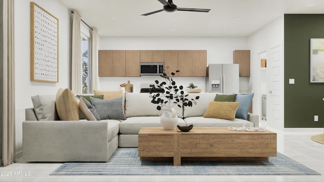 living area with ceiling fan and tile patterned flooring