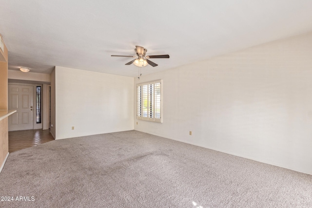 unfurnished room featuring carpet floors and ceiling fan