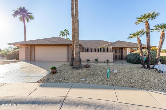 ranch-style home with a garage