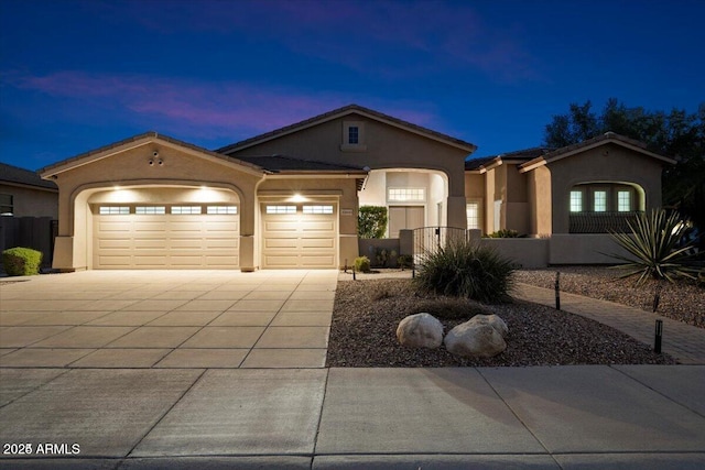 33945 N 57th Pl, Scottsdale, AZ 85266 - view of front of house with stucco siding, driveway, fence, and a garage