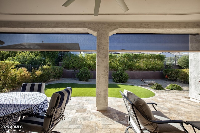 view of patio with ceiling fan