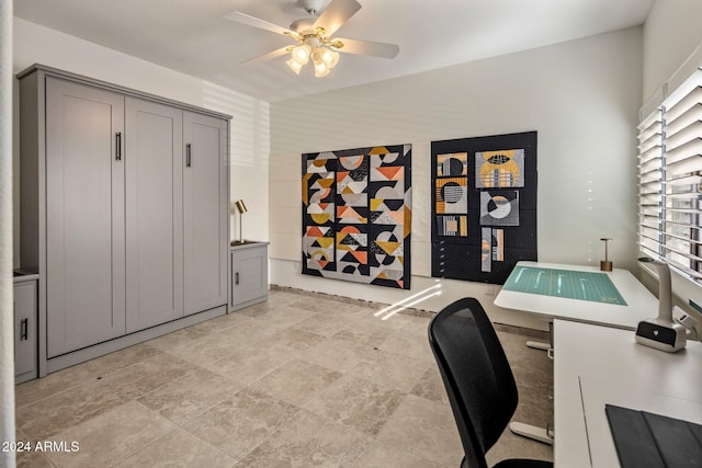 office area with ceiling fan