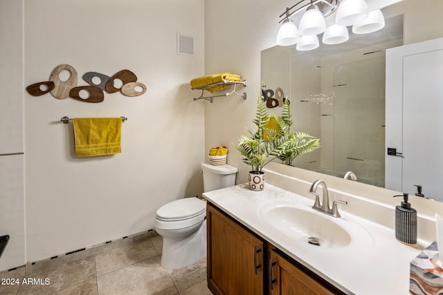 bathroom with walk in shower, vanity, and toilet