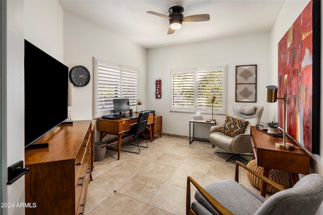 home office featuring ceiling fan and light tile patterned floors