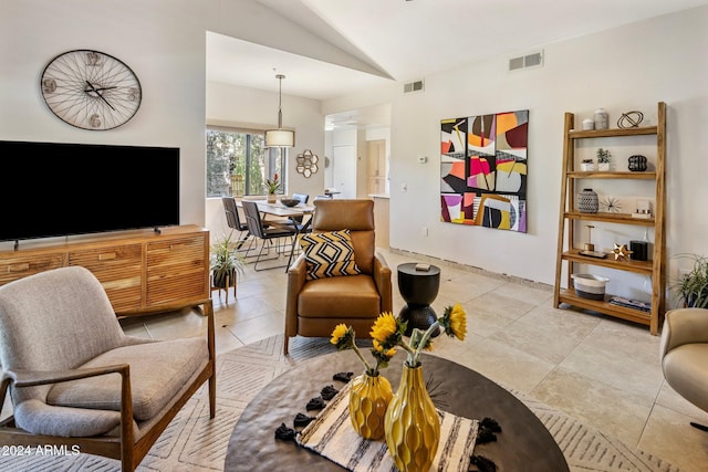 living room with lofted ceiling