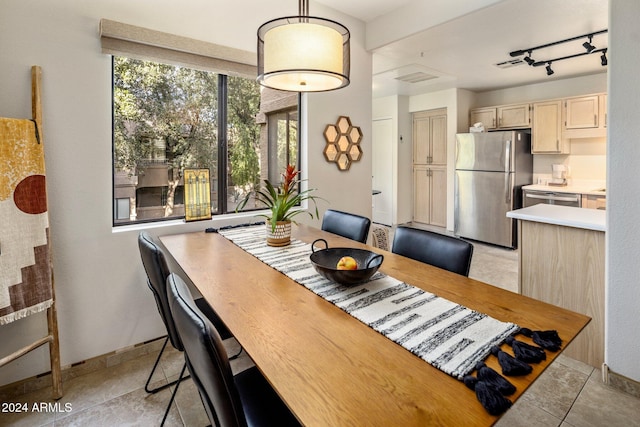 dining room with light tile patterned floors