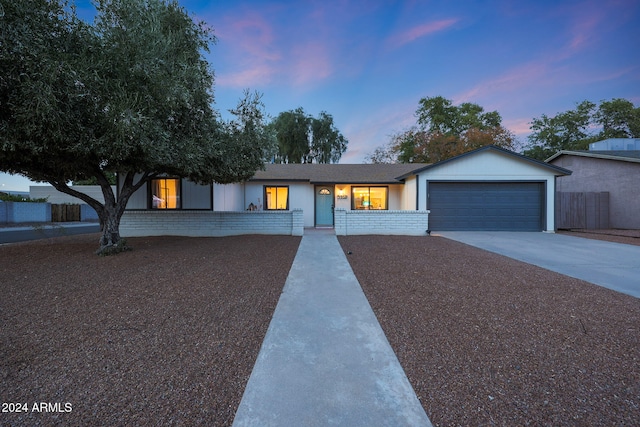 ranch-style house with a garage