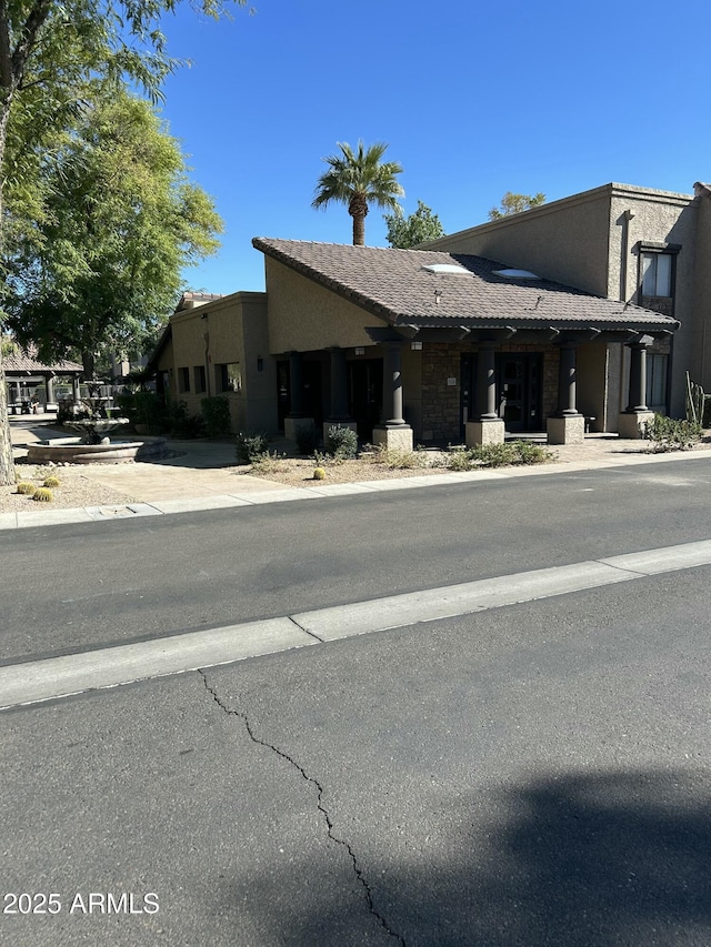 view of front of property featuring stucco siding