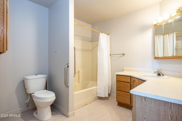 full bath featuring toilet, shower / bath combo, baseboards, and vanity