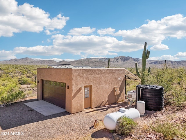 exterior space featuring a mountain view