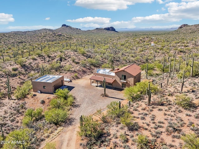 drone / aerial view featuring a mountain view