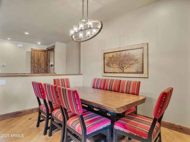 dining area featuring light wood-type flooring