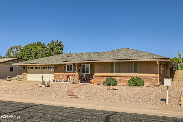 single story home featuring a garage