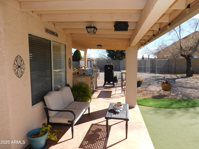 view of patio featuring a grill