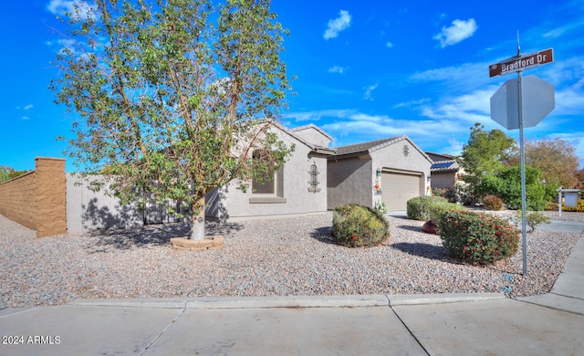 view of front of property with a garage