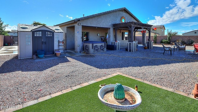 back of house featuring a pergola and a patio area