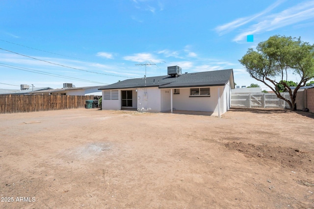 1051 E Millett Ave, Mesa, AZ 85204 - back of property featuring a fenced backyard and roof with shingles