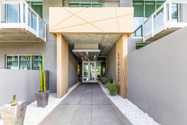 entrance to property featuring french doors