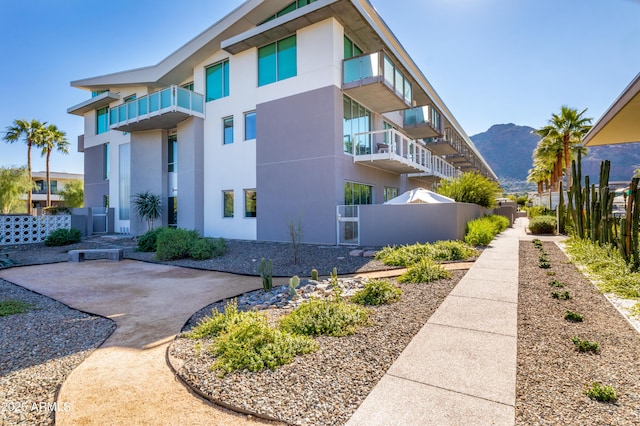 exterior space featuring a mountain view