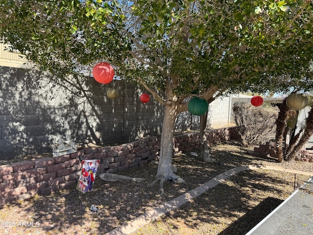 view of yard featuring fence